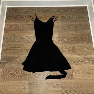 Fab’rik black mini dress with ruffle on bottom